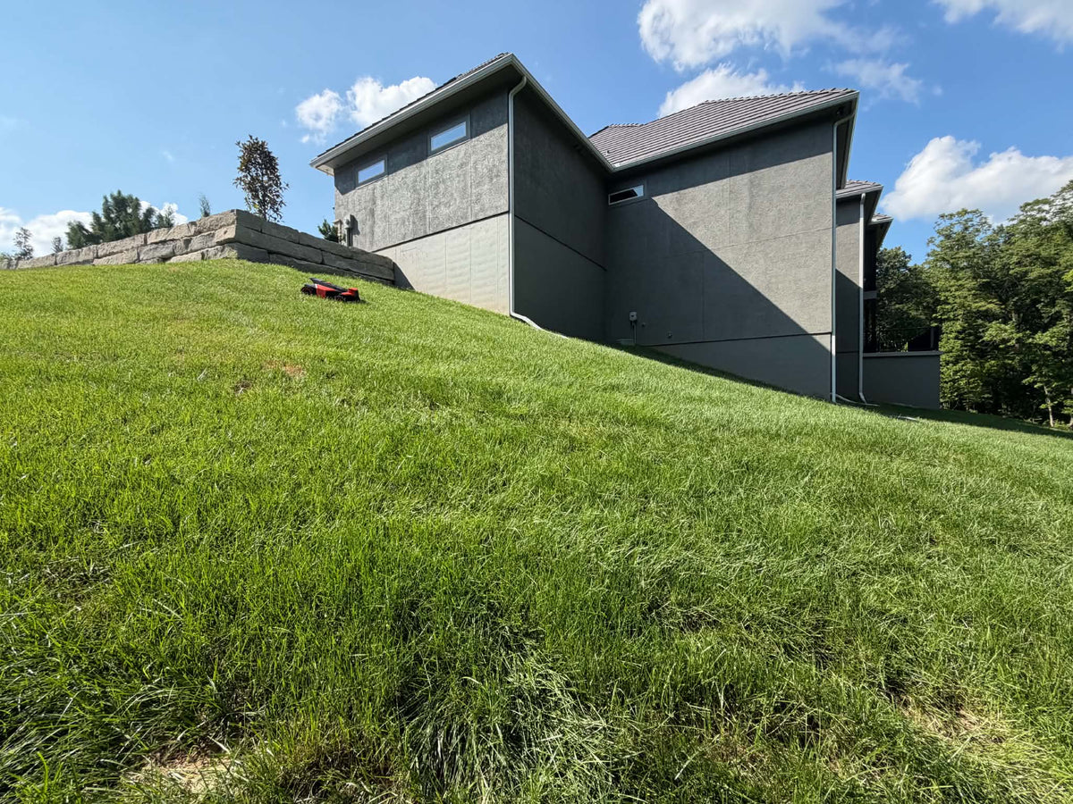 Segway Navimow X4 mowing a steep hill